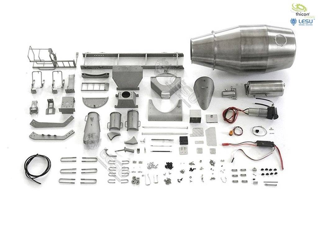 Kit for a miniature turbine with numerous components and accessories arranged on a white background.