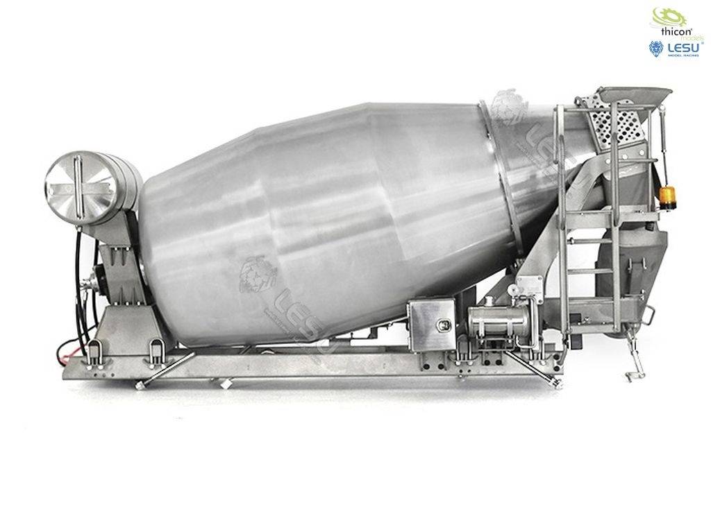 A large, silver drum device on a stand, most likely an industrial mixing machine.