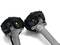 Two mechanical components with black covers and metallic pipes; glowing points in their centres, on a white background.