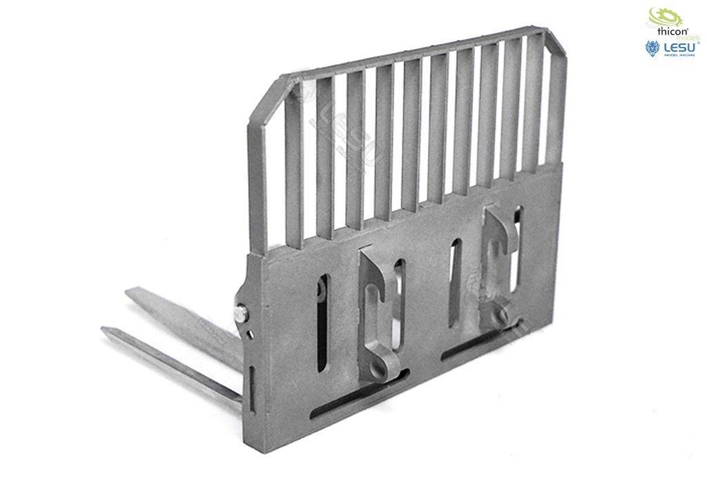 'Metal lattice structure with two forks in industrial design, possibly part of a machine or vehicle tool.'