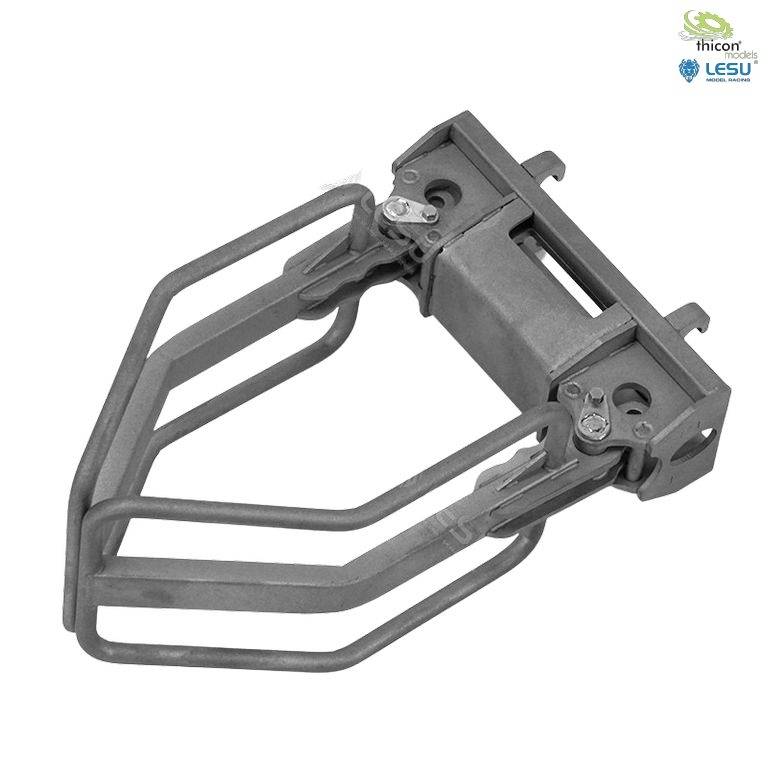 A silver metal tool with handles and hinges, most likely a modern mechanical gripper or clamping device.