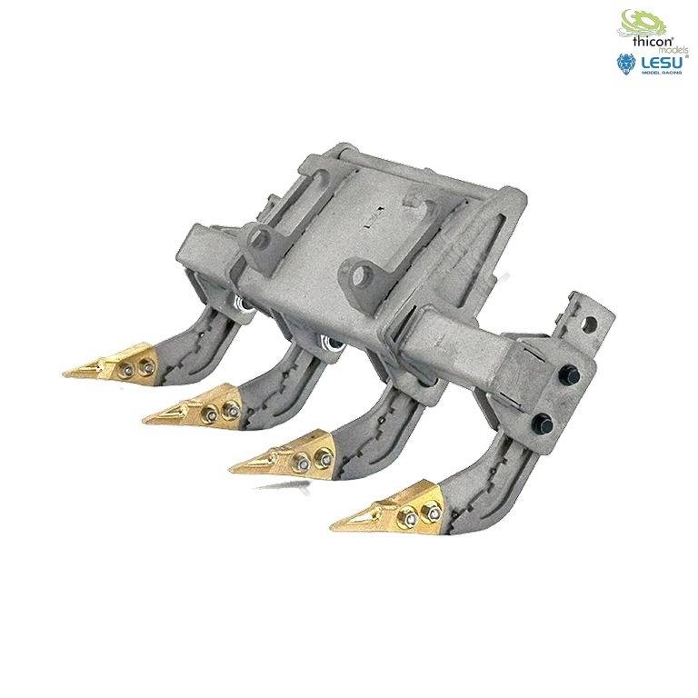 Four metal teeth with golden tips on a heavy grey frame.