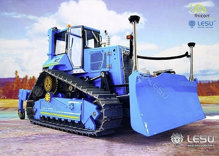 A blue tracked excavator stands on a construction site. A cloudy sky is visible in the background. The 'LESU' brand logo is visible.