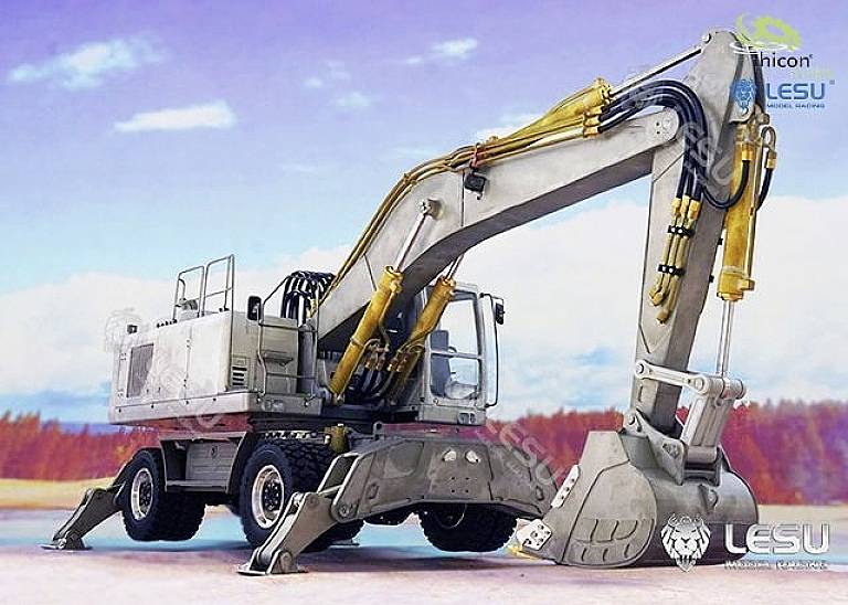 A grey excavator with yellow hydraulic arms stands on a concrete surface against a cloudy sky. Trees are visible in the background.