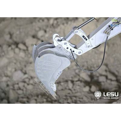 Grab bucket on an excavator arm over a sandy surface. The LESU logo is visible in the corner.