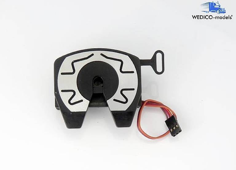 Electronic component with a black housing and silver top surface. Red and black cables run with a plug.