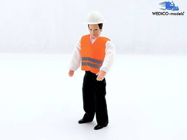 A figurine in builder's attire, wearing a white hard hat and orange high-visibility vest, stands on a white surface.