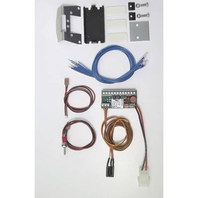 Electronic kit on a white background. Contains cables, switches, circuit board and mounting elements. Suitable for DIY projects.