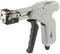 Hand stapler with an ergonomic grip, grey casing, and trigger. Tool for fastening materials such as fabric or paper.