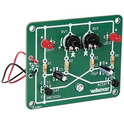 Electronic circuit on a circuit board with various components such as LEDs, potentiometers and resistors, connected to a power source.