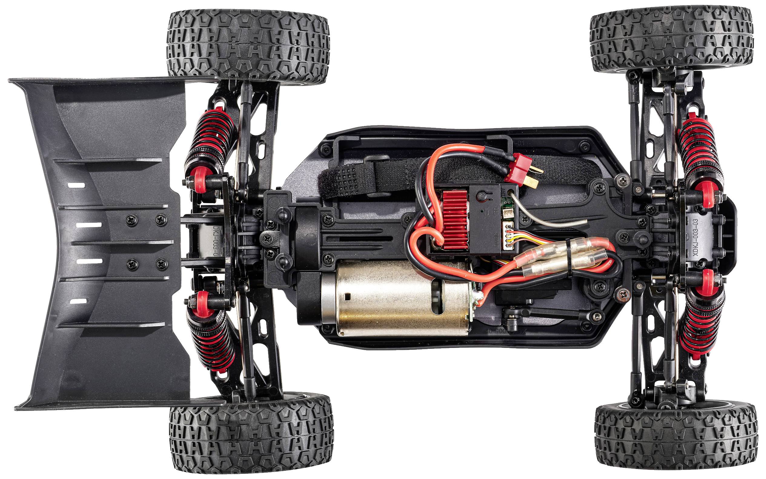Remote-controlled car chassis viewed from above, showing engine, suspension, and cables.