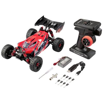 Remote-controlled red car with accessories, including a charger, batteries, screwdriver and a remote control.