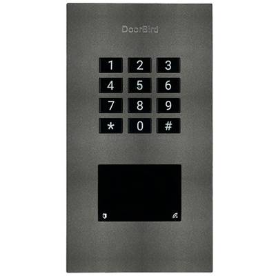 A black door intercom with a numeric keypad from 0-9, including star and hash keys. 'DoorBird' is displayed at the top.
