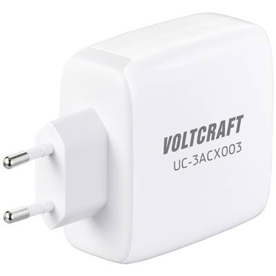 A white power supply unit by the brand Voltcraft, model UC-3ACX003, with two metal prongs for connection to a mains socket.