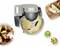 'Overhead view of a stand mixer with mixing bowl, surrounded by apple cake, bread slices with butter, and ingredients in small bowls.'