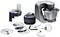 A food processor with accessories including a mixing bowl, various cutting and mixing attachments, and a storage bag.