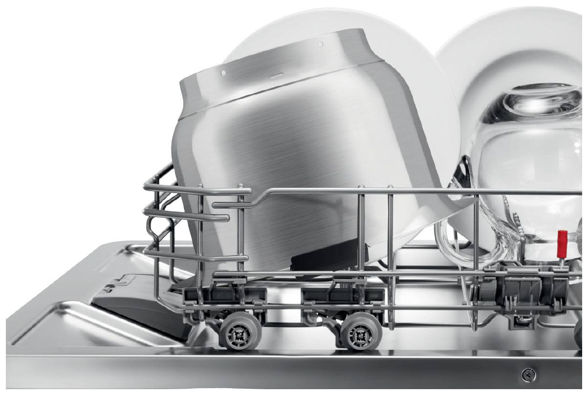 Dishwasher, bottom rack: large pot, plate and glass positioned correctly. Stainless steel design with roller mechanism visible.