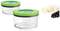 Two round, transparent containers with green lids, next to some cheese and grapes. Suitable for food storage.