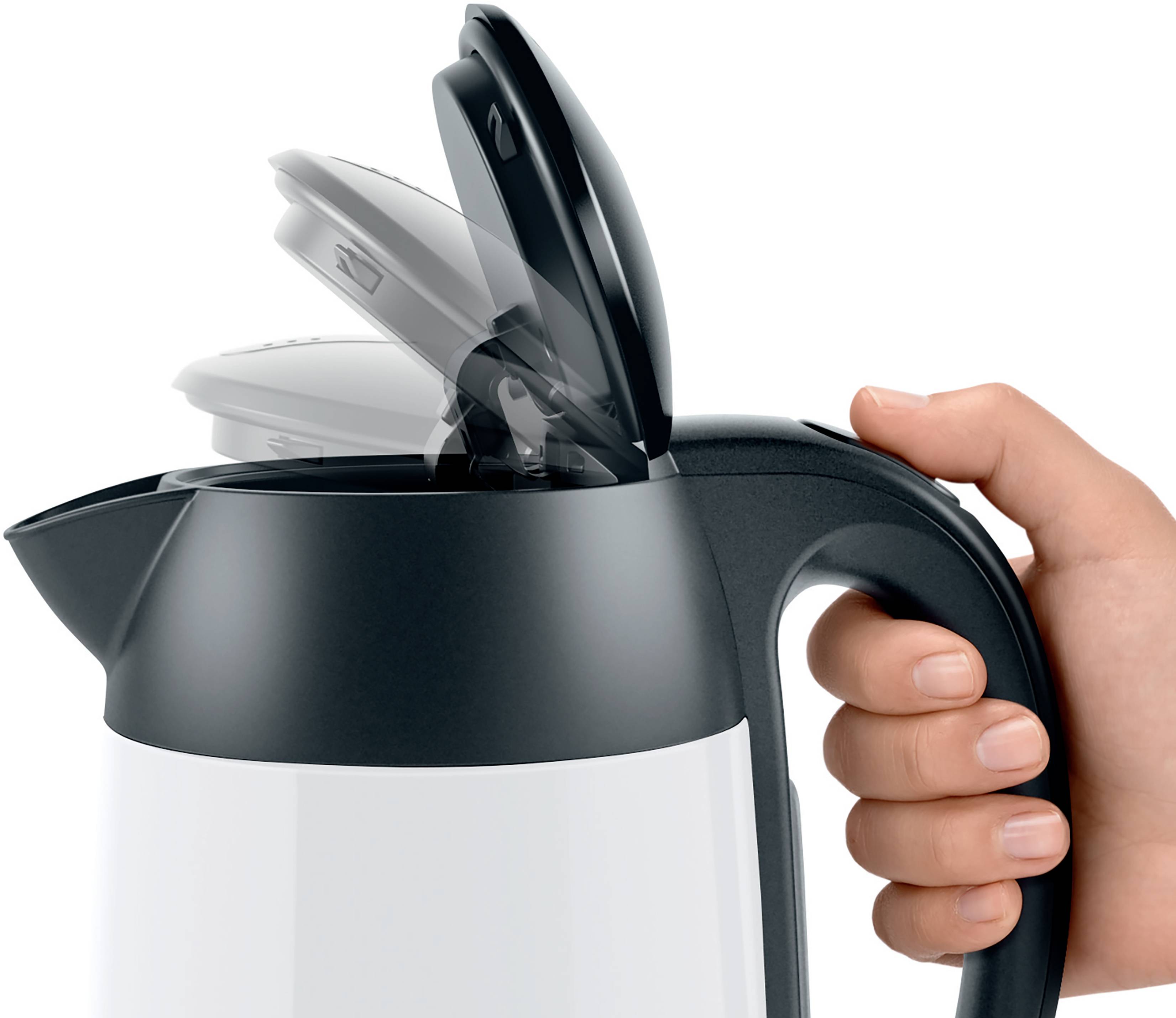 A hand is holding the handle of a kettle while the lid is being opened. The kettle is predominantly white and black.
