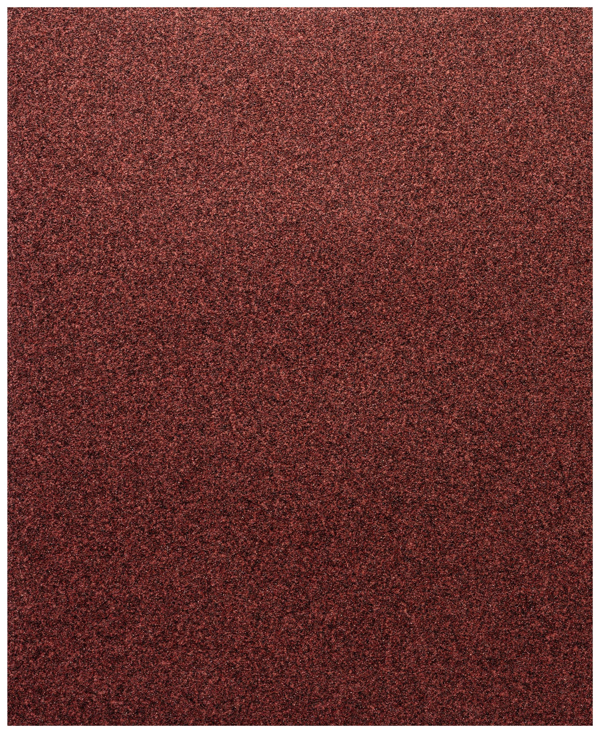 A rectangular piece of sandpaper in a coarse-grained rust-red colour. It conveys a sense of roughness and is suitable for sanding work.