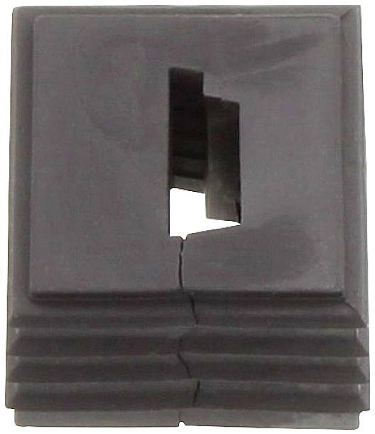 A rectangular plastic piece with a central slot and several fracture points along a line, indicates damage.