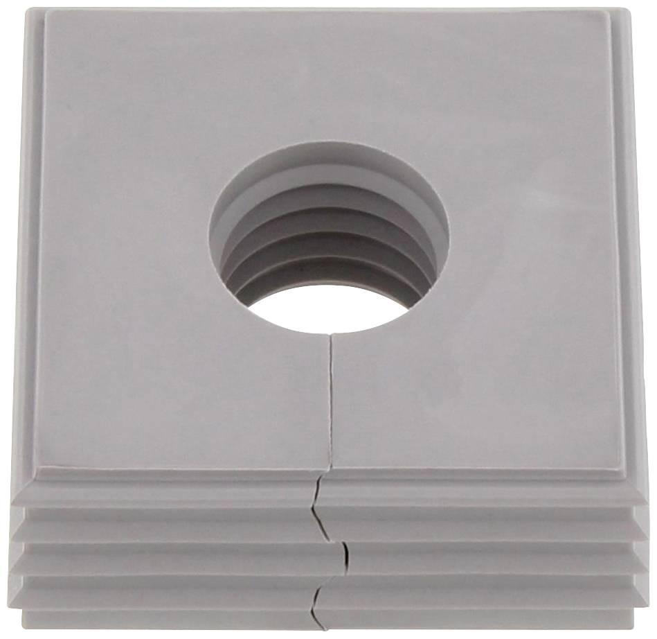 A grey, square piece with a central, graduated opening and a crack line. It displays a structured design.