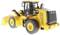 A yellow loader model tractor stands in profile. It has large wheels and a distinctive black frame with a shovel arm.