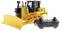 Remote-controlled yellow toy bulldozer with motion control, yellow plough at the front. Scale model of a Caterpillar vehicle.