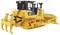 A yellow toy bulldozer with caterpillar tracks and a movable shovel, manufactured by CAT, on a white background.