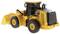 Yellow toy bulldozer with a black cabin, shown from the side. Intricately designed, with movable parts and robust wheels.