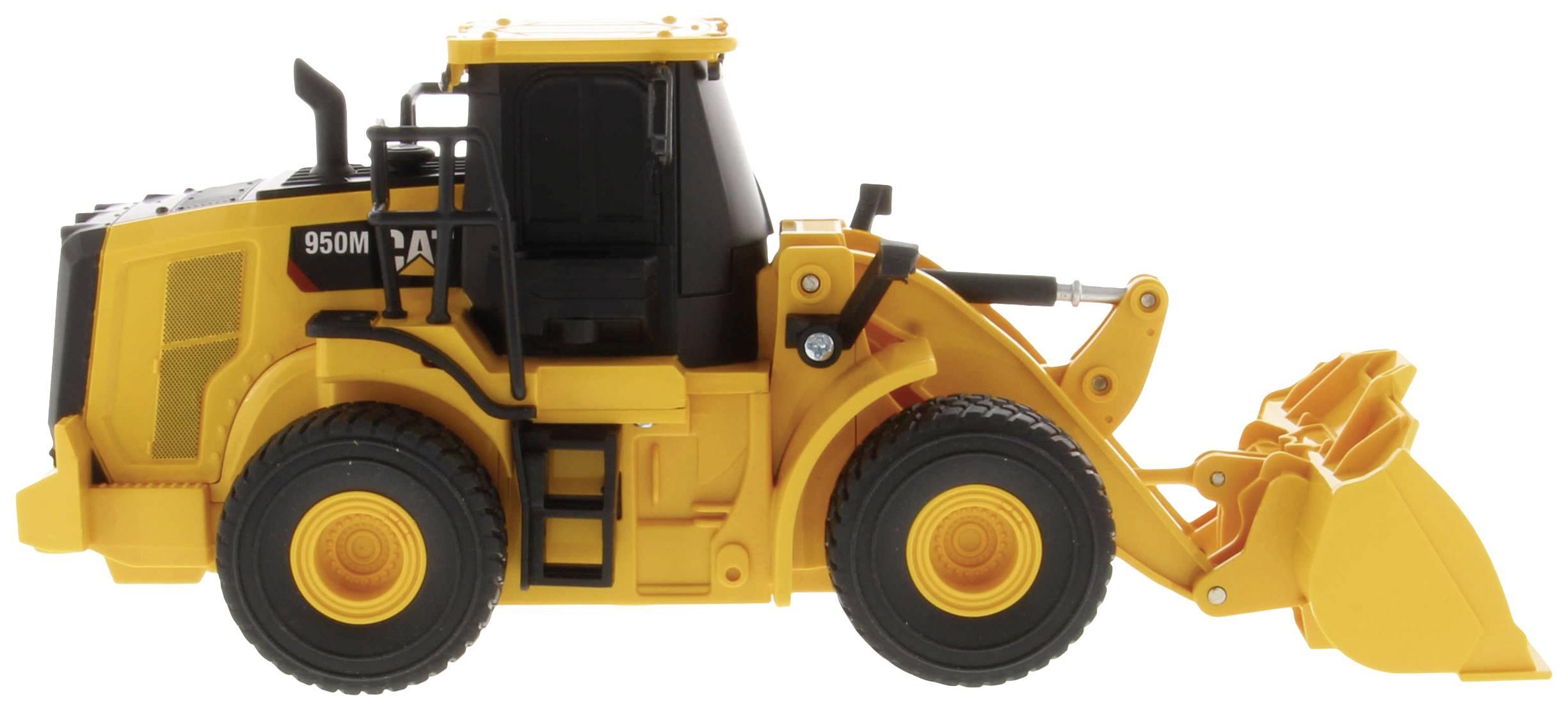 Yellow toy digger, side view. The model shows details such as wheels, loading area, and driver's cab.