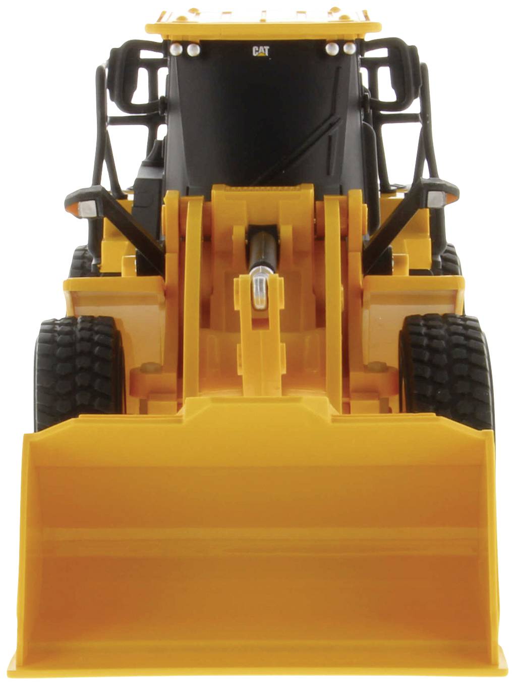 A yellow excavator with a large bucket stands in a front view.