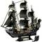A model of a historical sailing ship with black sails. The ship has numerous details and stands on a plinth.