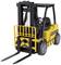 A yellow toy forklift with black and yellow stripes, meticulously designed, set against a white background.