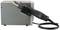 Electronic soldering iron with stand, used for soldering electronic components. Black handle, grey casing.