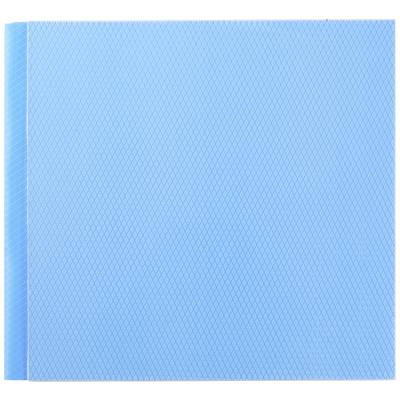 A blue notebook with a geometric pattern on the cover.