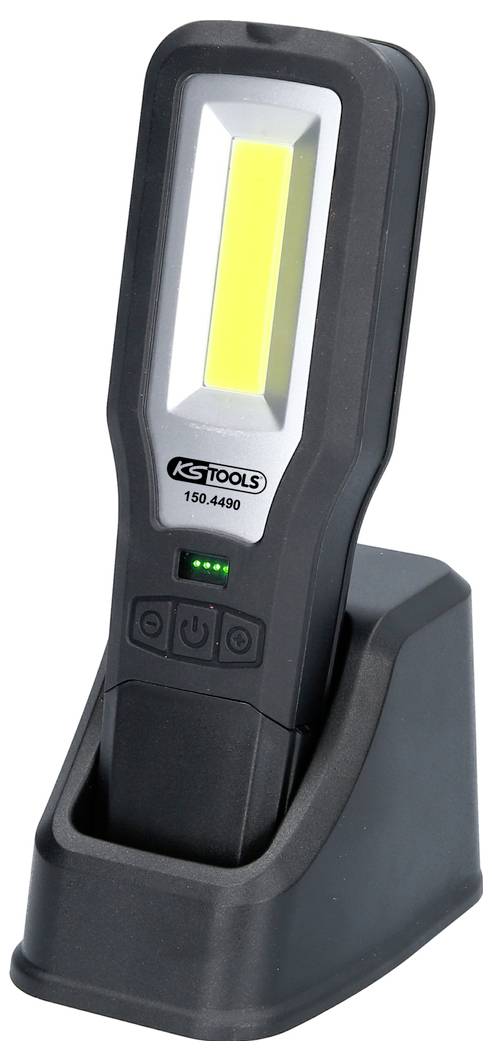 Portable LED work light in charging station. Black casing, yellow light panel at the front. Brand logo and buttons visible.