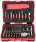 A red tool set with various screwdriver attachments and bits in an open box, arranged in rows.