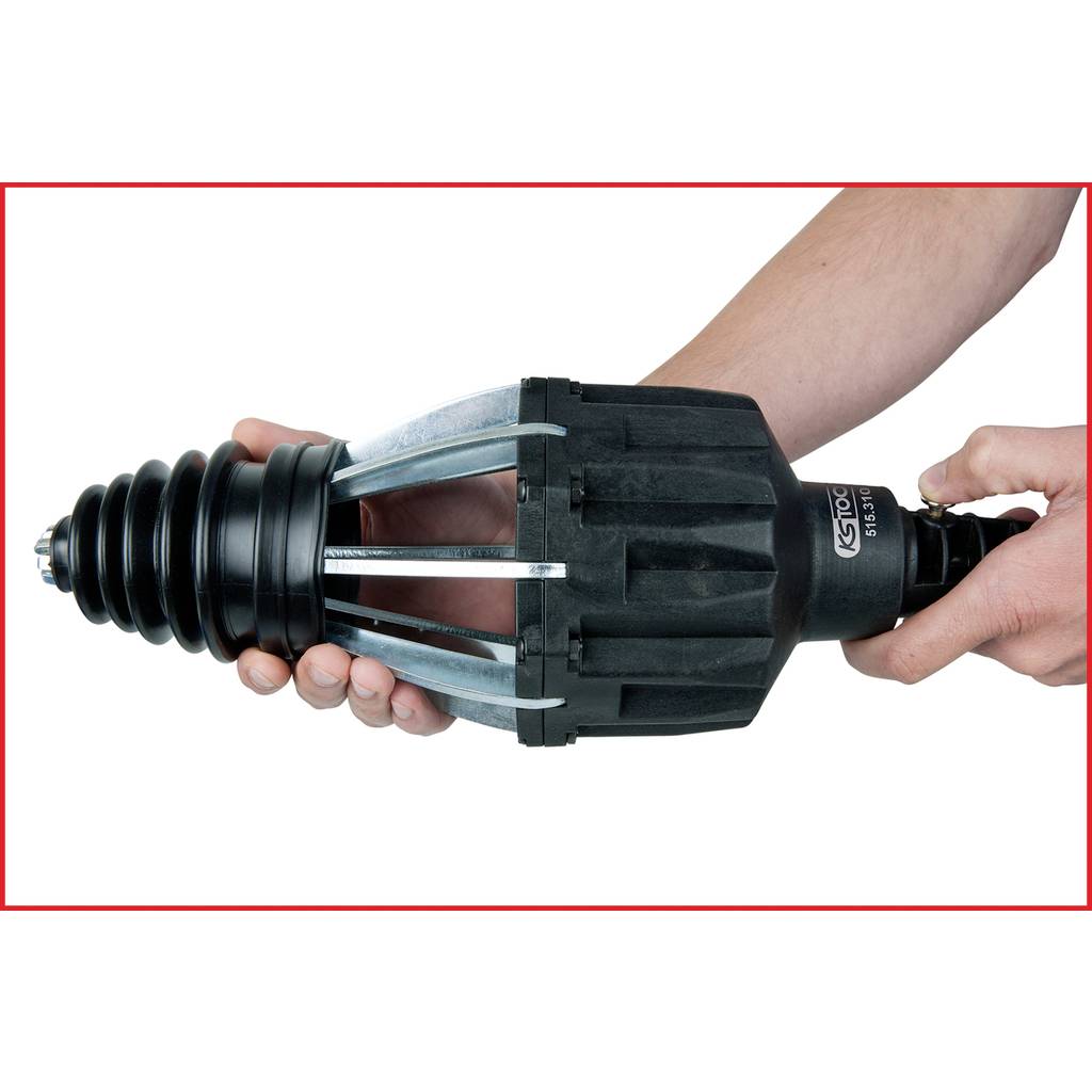 A person holds a mechanical device with accordion-like sections and a grip, suggesting a tool or part used for industrial purposes.