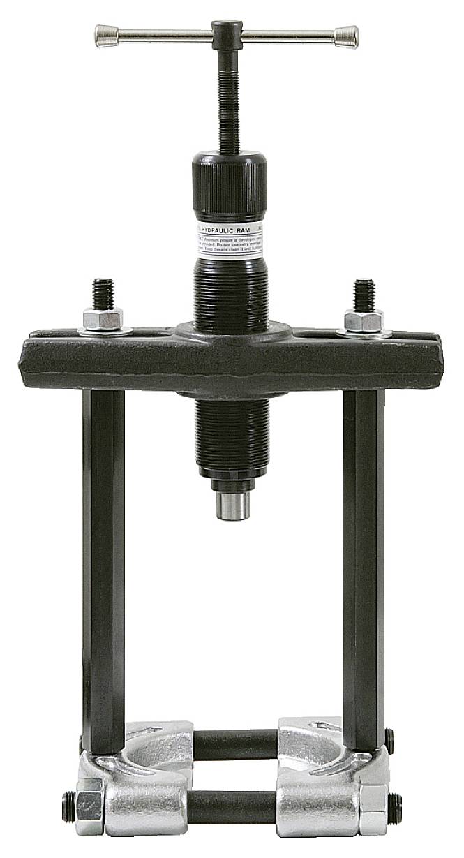 'A puller tool for removing bearings or bushes, with a central spindle handle and adjustable arms.'