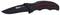 A black folding knife with a non-slip grip and red perforated design, suitable for outdoor and everyday applications.