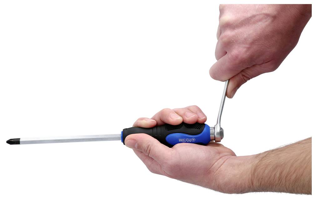 'A person using a wrench to turn a screwdriver driver bit in their hand, demonstrating a tool setup or technique.'