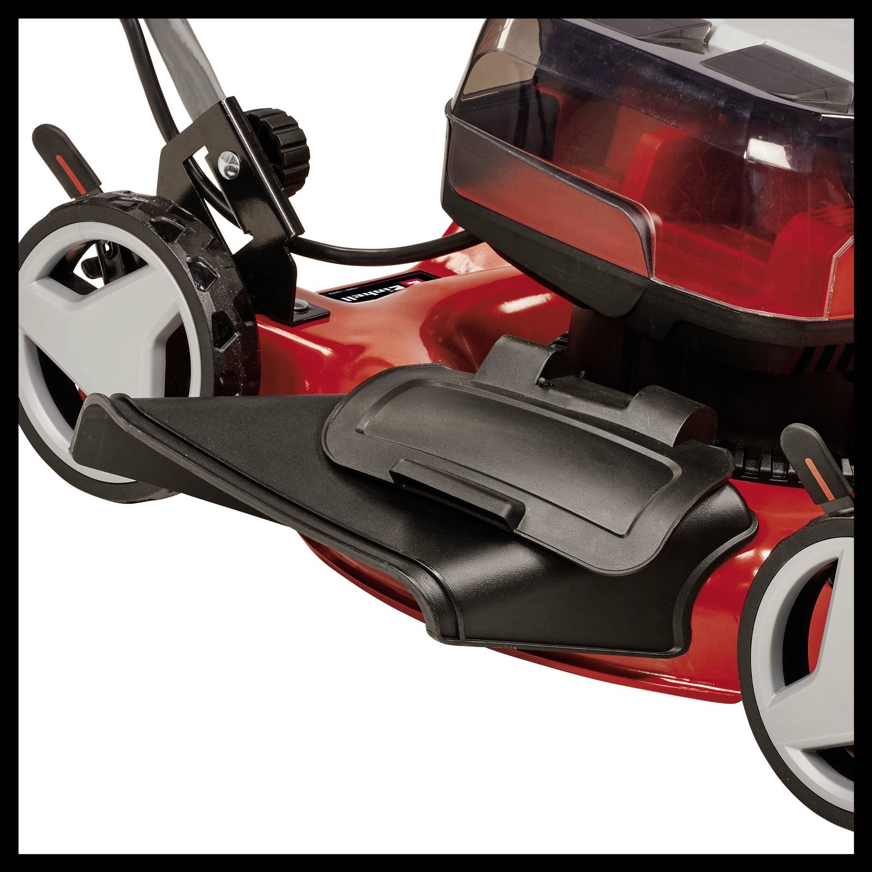 Lawnmower with a black and red casing, large wheels, and a black grass collection bag.