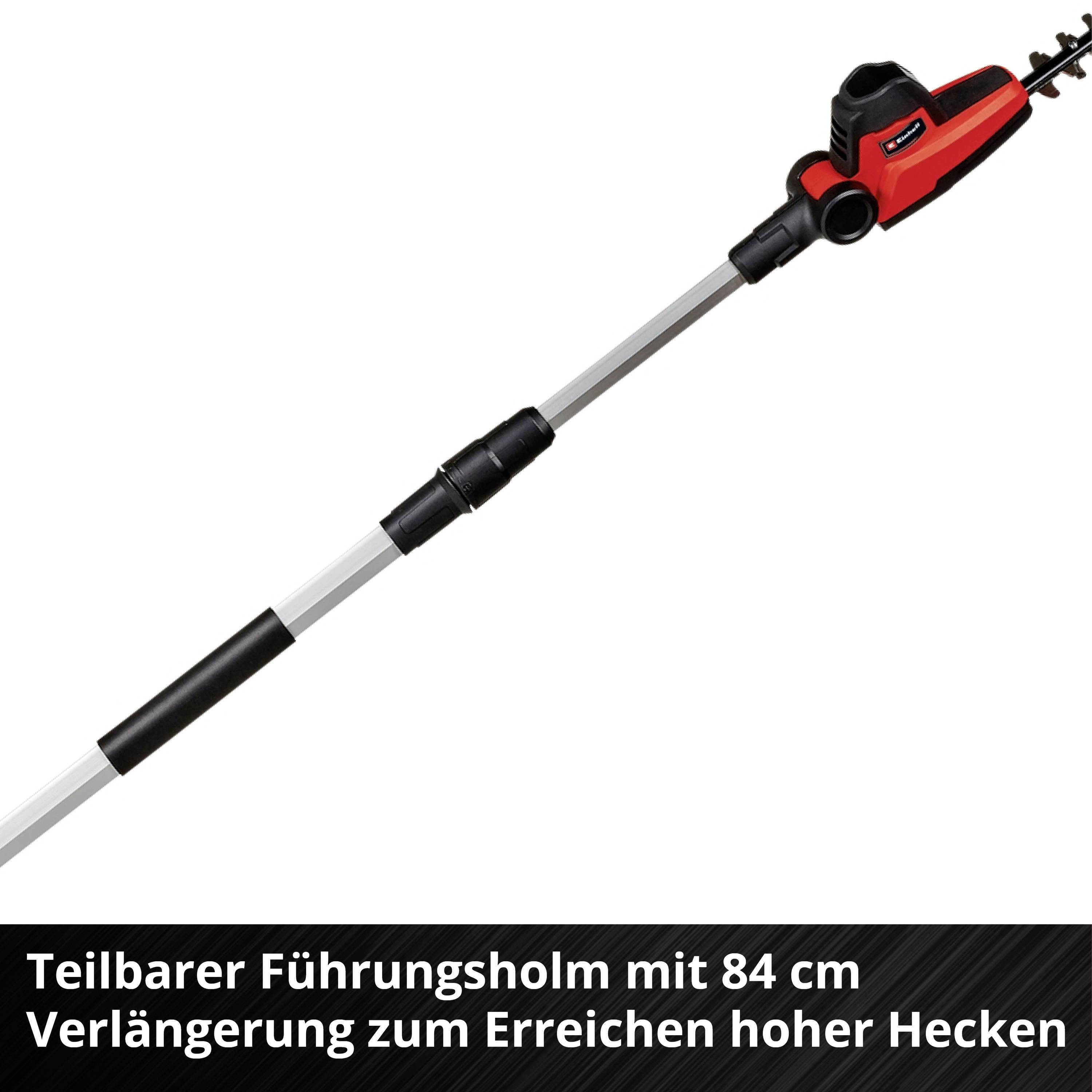 Electric hedge trimmer with telescopic handle, perfect for cutting tall hedges.