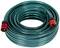 A coiled green garden hose with red connectors for watering in the garden.