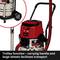 Einhell vacuum cleaner with large wheels and carry handle for easy movement. Text: Trolley function – carry handle and large wheels make transportation easier.
