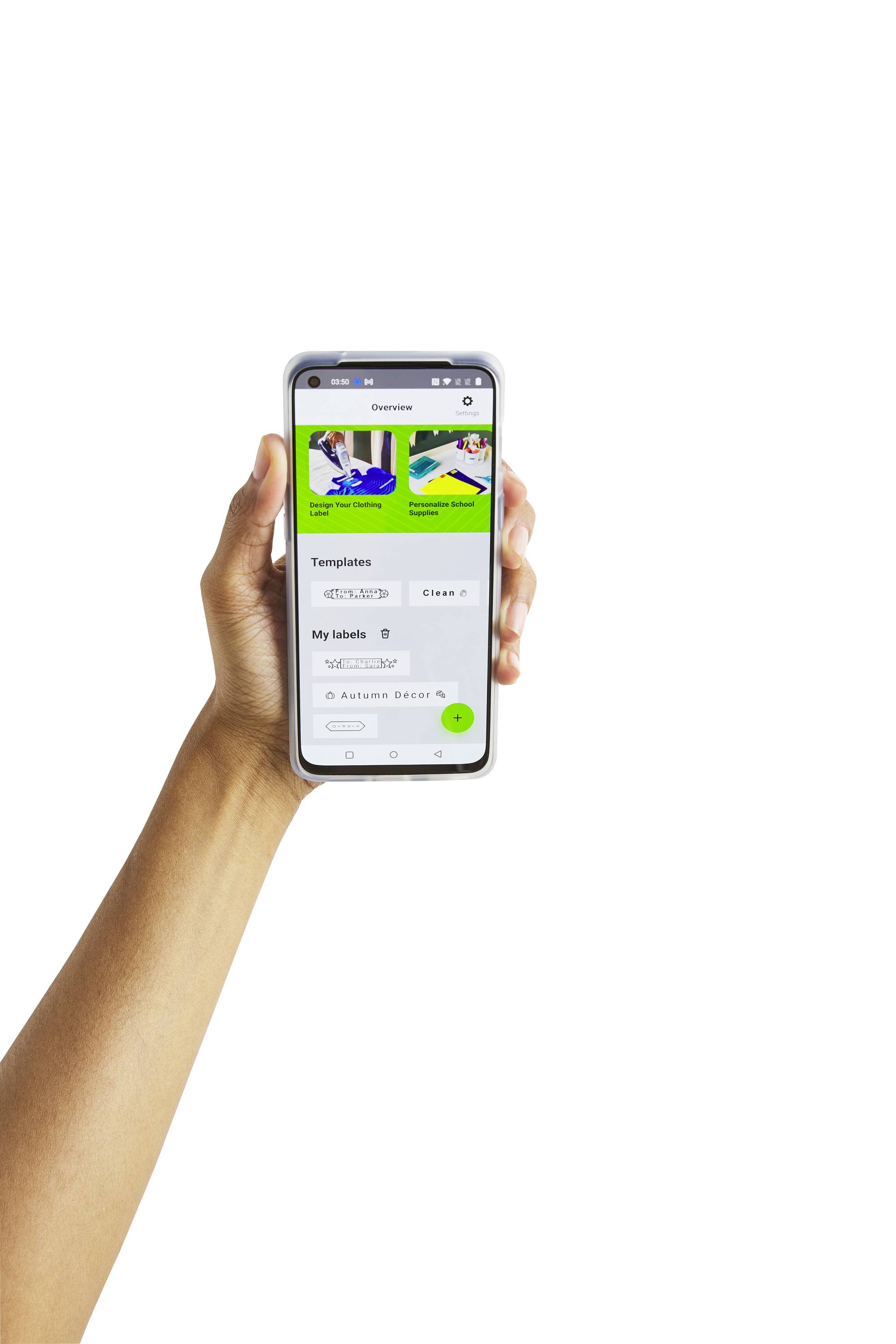 A hand is holding a smartphone with an app interface displaying image templates and settings. The main focus is on the device and its screen.