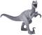 Grey toy model of a velociraptor in an aggressive stance, with widely opened mouth and raised claws.