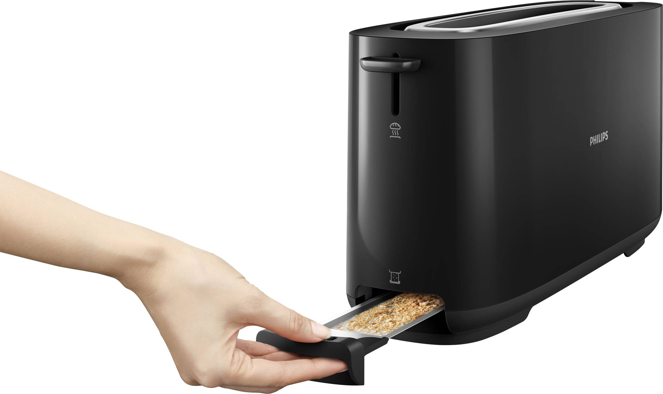 Black toaster with a crumb tray being pulled out by a hand.