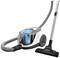 Cylinder vacuum cleaner with grey hose and blue filter indicator, mounted on wheels, tilted to the side. Suitable for cleaning smooth floors.